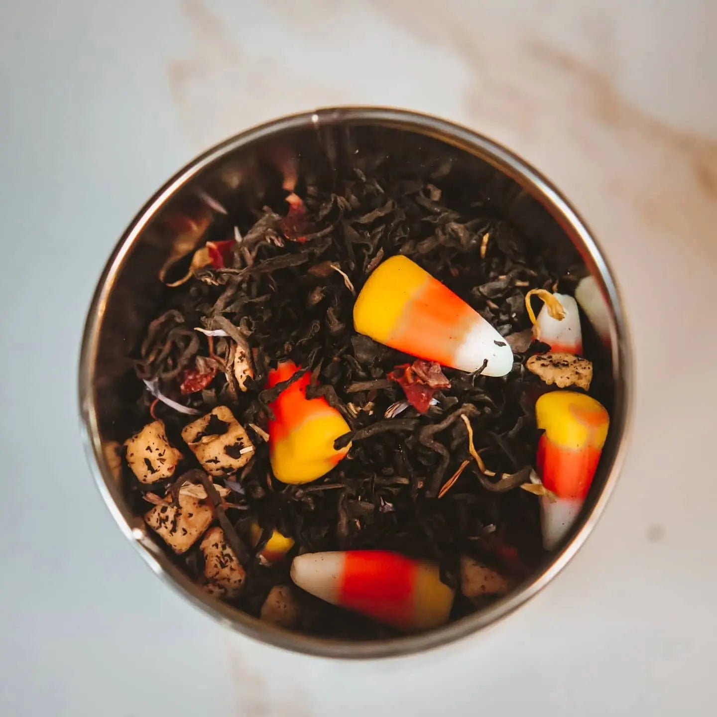 Scarecrow Fall Black tea made with real Candy Corn, apples, oranges, and cinnamon! Kimberlys Kupboard